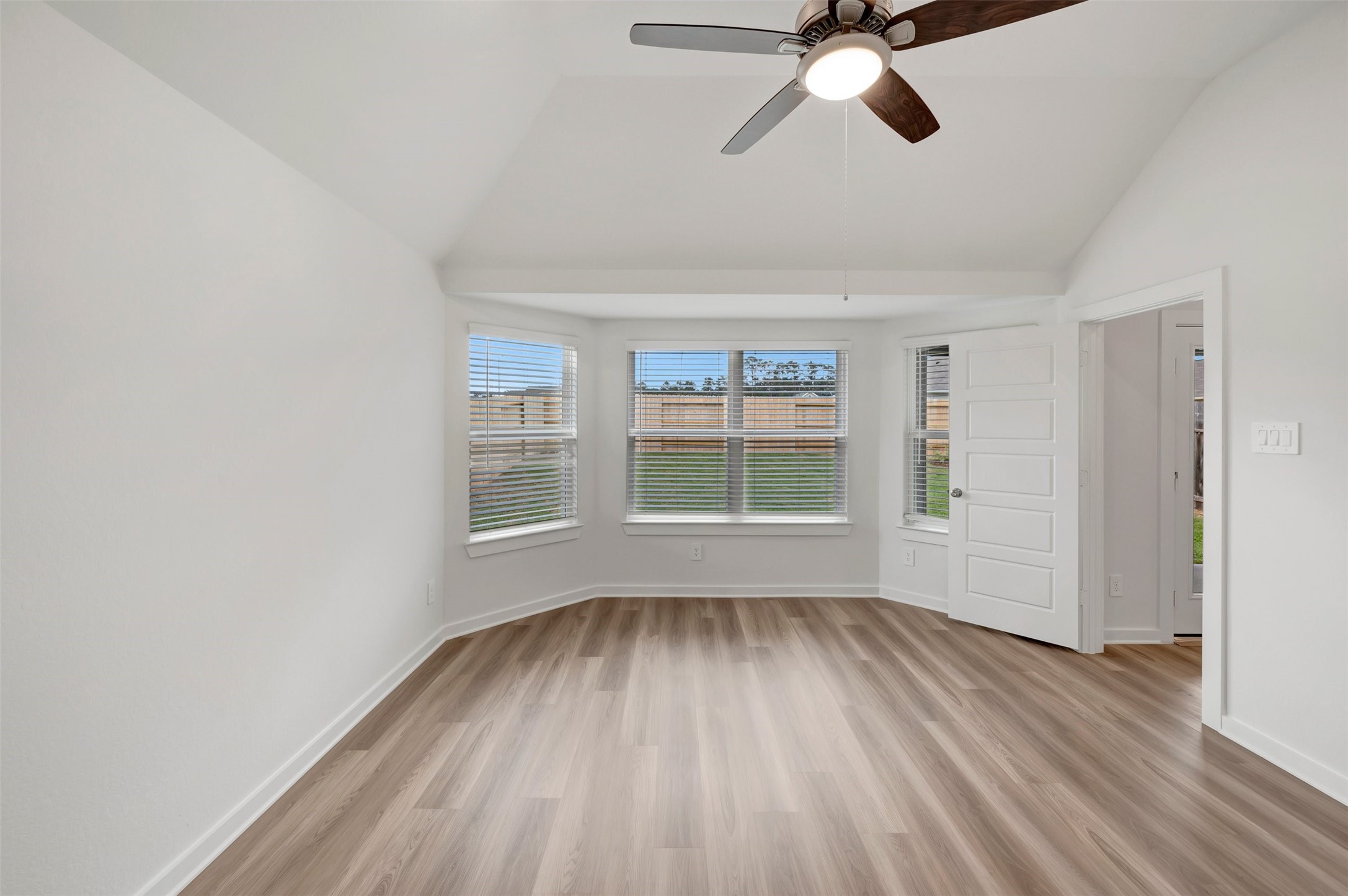 543 Flower Reed Court Magnolia, TX 77354 - Photo 36 of 46 a view of empty room with wooden floor and window