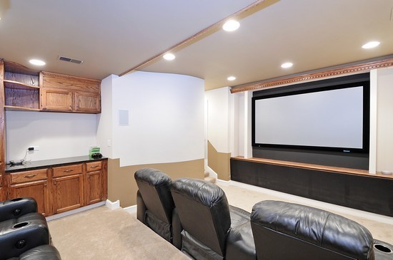 590 Sheridan Road Winnetka, IL 60093 - Photo 10 of 16 a room with furniture and a projector screen