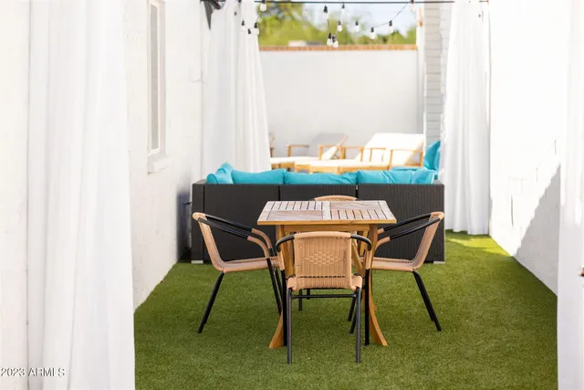 a view of a swimming pool with a patio