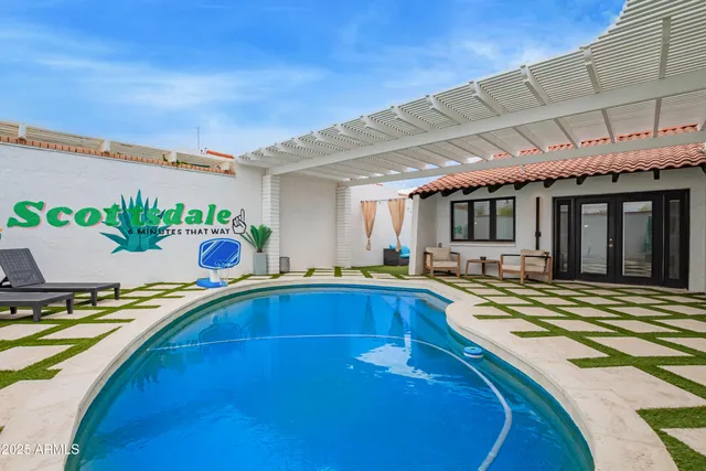 a view of a room with air conditioner and window