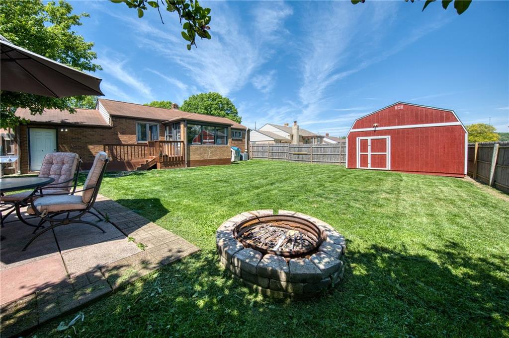 902 Foster Street Clairton, PA 15025 - Photo 34 of 45 Large level back yard perfect for entertaining features a large shed for storing yard care items