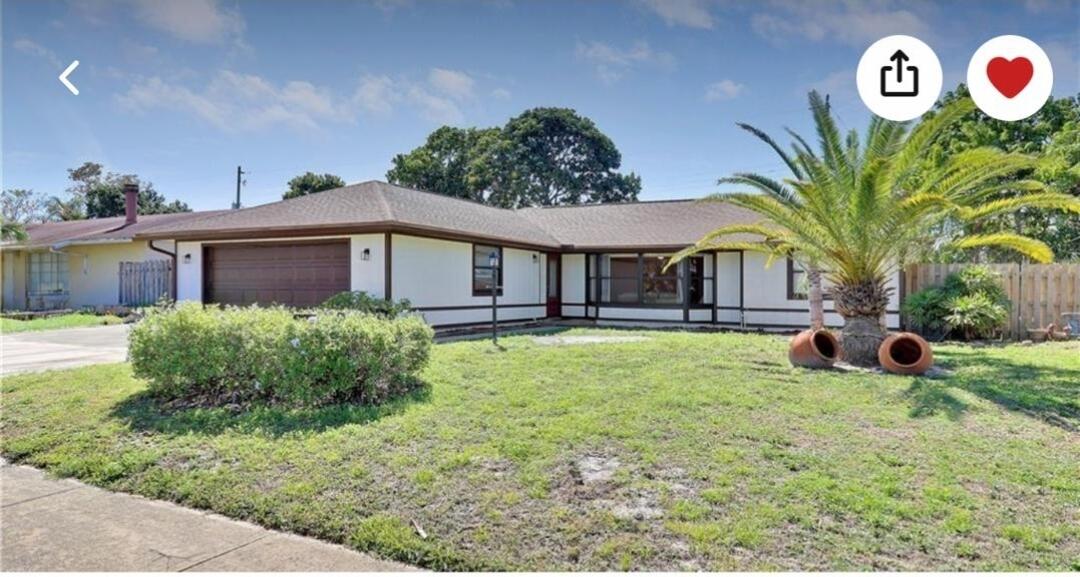 1237 Wynnedale Road, Unit 1237 West Palm Beach, FL 33417 - Photo 19 of 20 a view of outdoor space yard and balcony