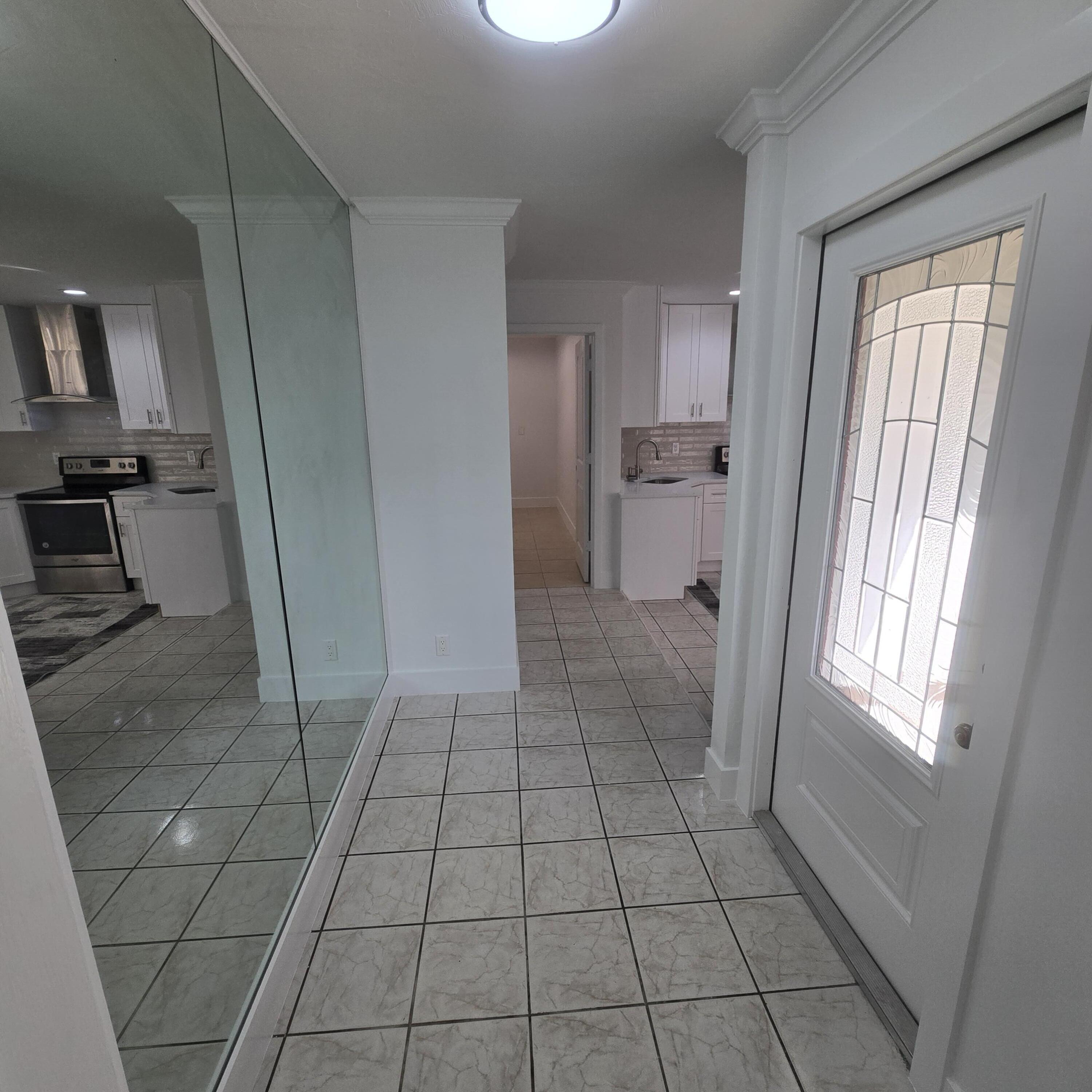 1237 Wynnedale Road, Unit 1237 West Palm Beach, FL 33417 - Photo 3 of 20 a view of an empty room and a window