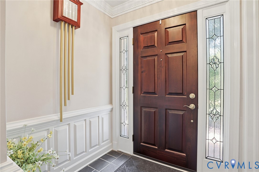 13300 West Patrick Henry Road Doswell, VA 23047 - Photo 4 of 69 Panel-style entry door with decorative sidelights,