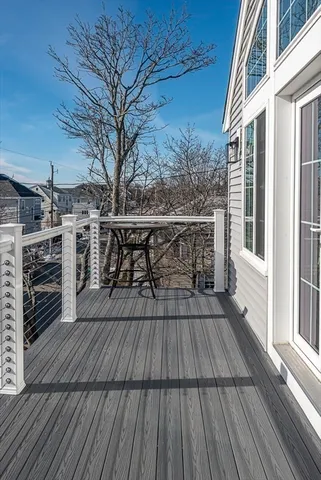 a kitchen with a sink cabinets and window