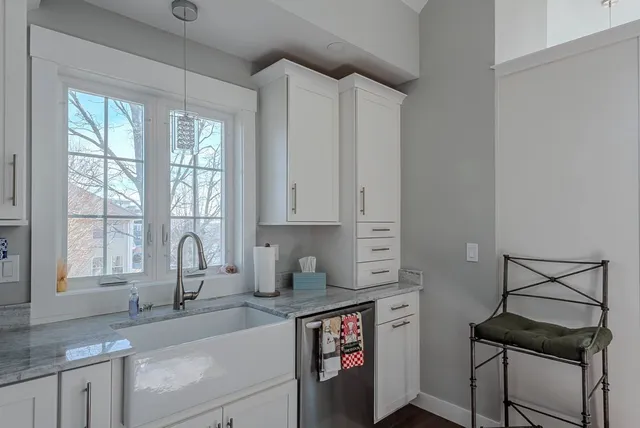 a view of a car park in front of a house