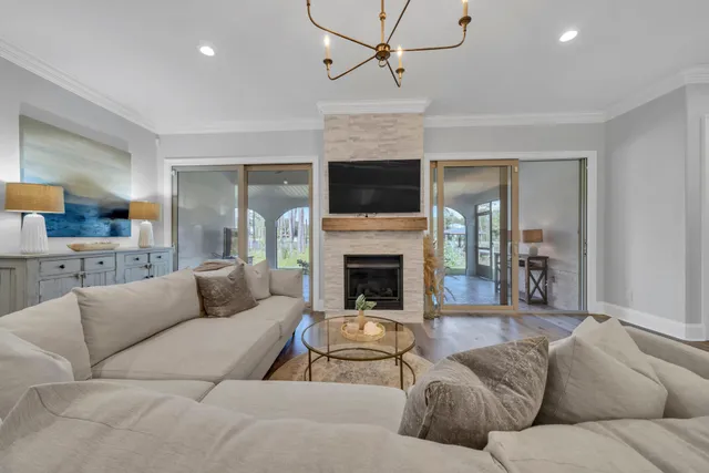 a spacious bathroom with a double vanity sink a mirror and a bathtub