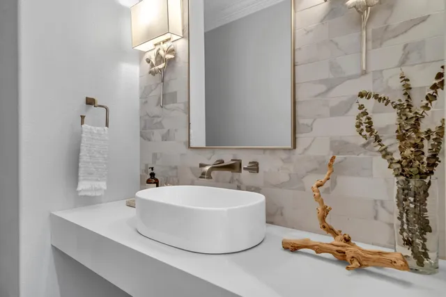 a bedroom with bed and window