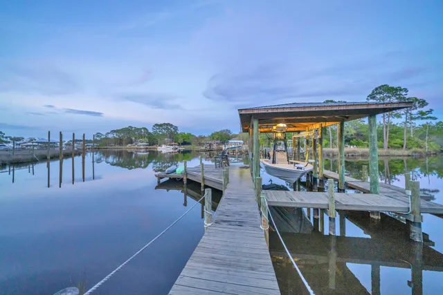 a view of dining room and hall with wooden floor