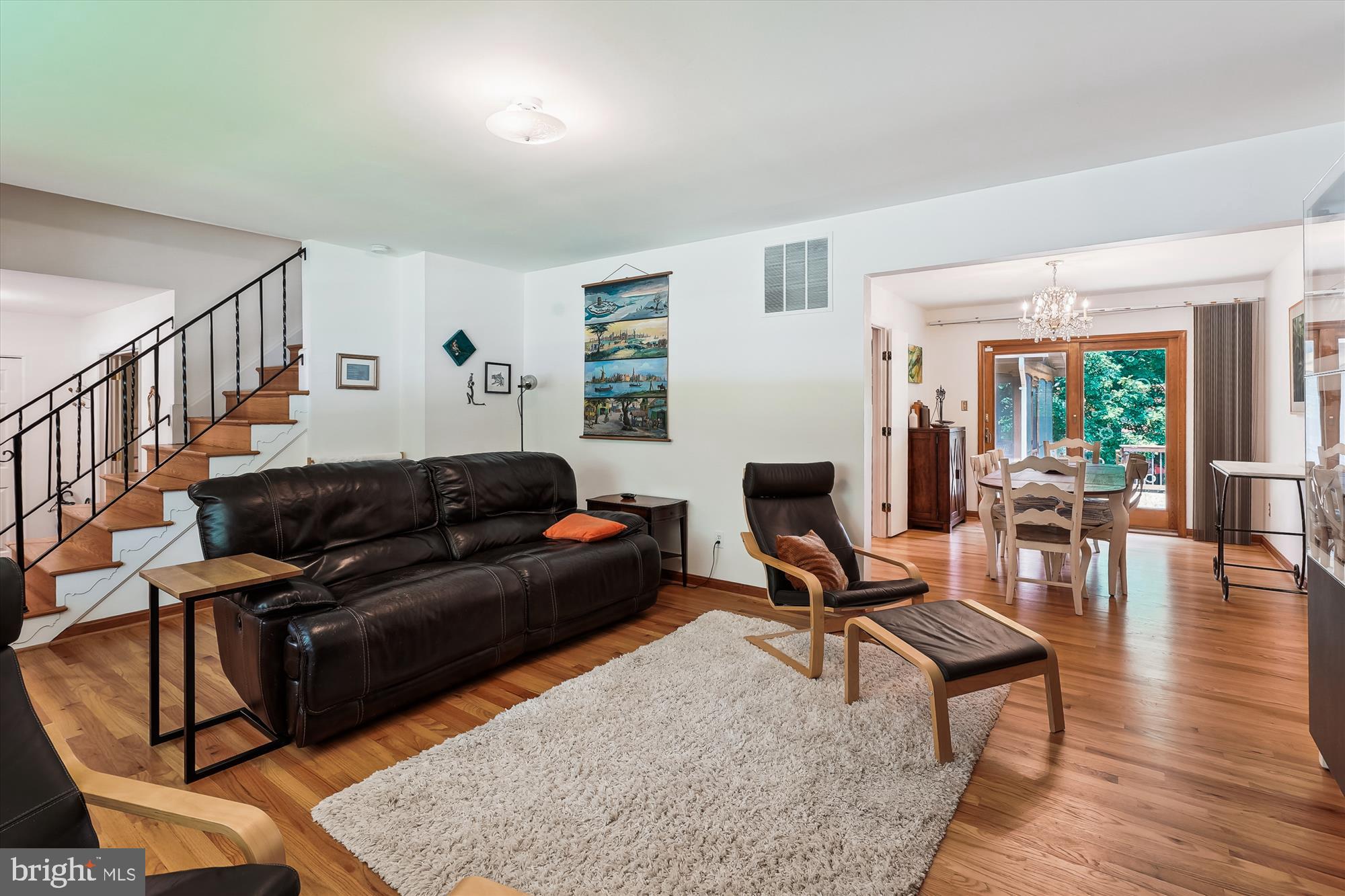 8510 Oakford Drive Springfield, VA 22152 - Photo 15 of 36 a living room with furniture and a wooden floor