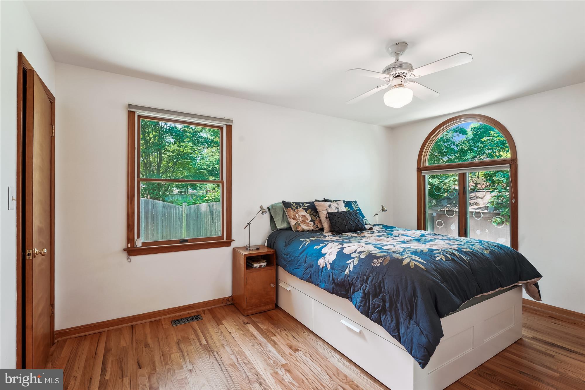 8510 Oakford Drive Springfield, VA 22152 - Photo 17 of 36 a bed sitting in a bedroom next to a window