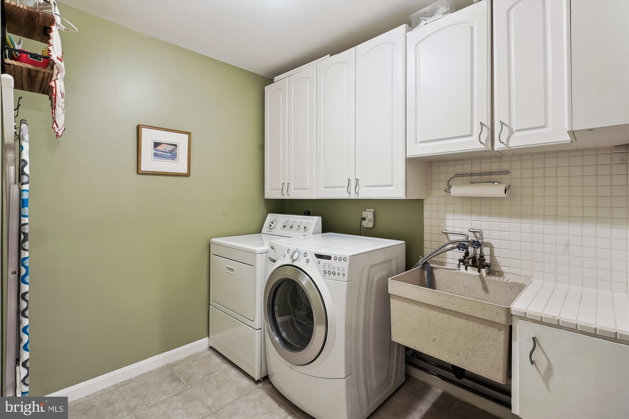 8510 Oakford Drive Springfield, VA 22152 - Photo 22 of 36 a utility room with dryer and washer