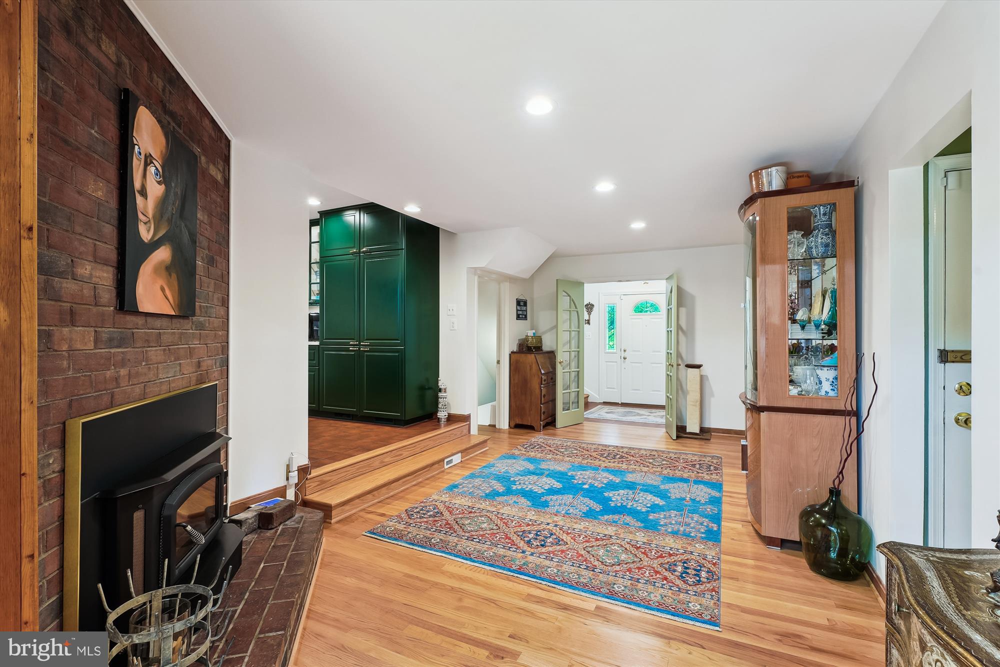 8510 Oakford Drive Springfield, VA 22152 - Photo 4 of 36 a living room with fireplace furniture and a rug