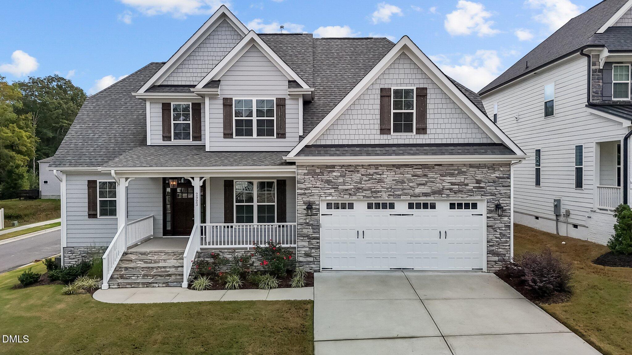 2923 Logan Valley Path Apex, NC 27502 - Photo 1 of 20 a front view of a house with a yard