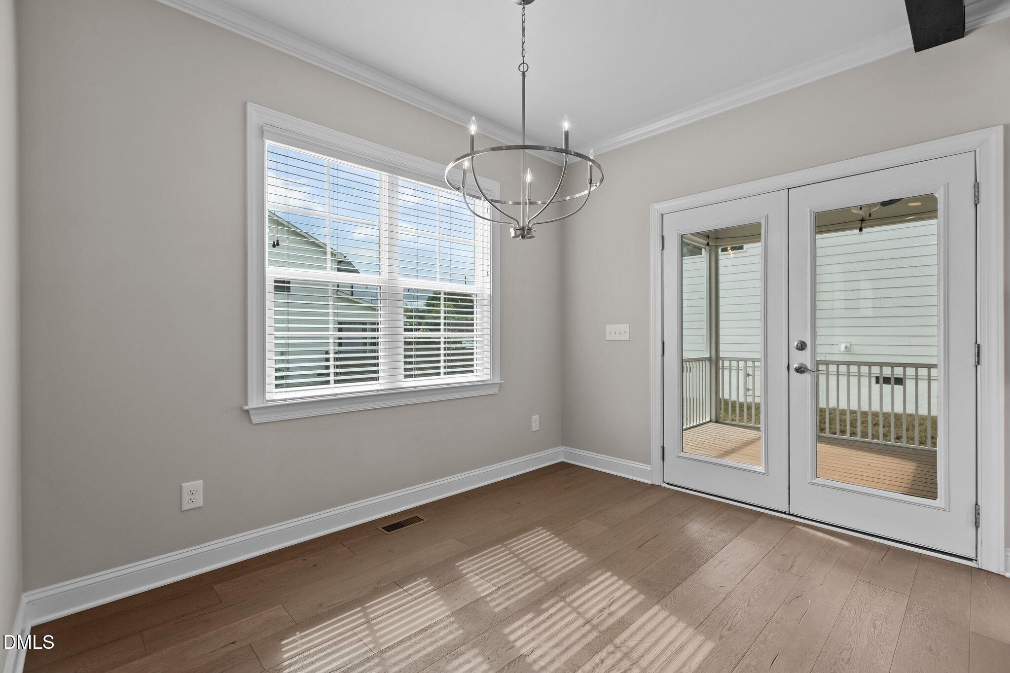 2923 Logan Valley Path Apex, NC 27502 - Photo 11 of 20 a view of an empty room with a window