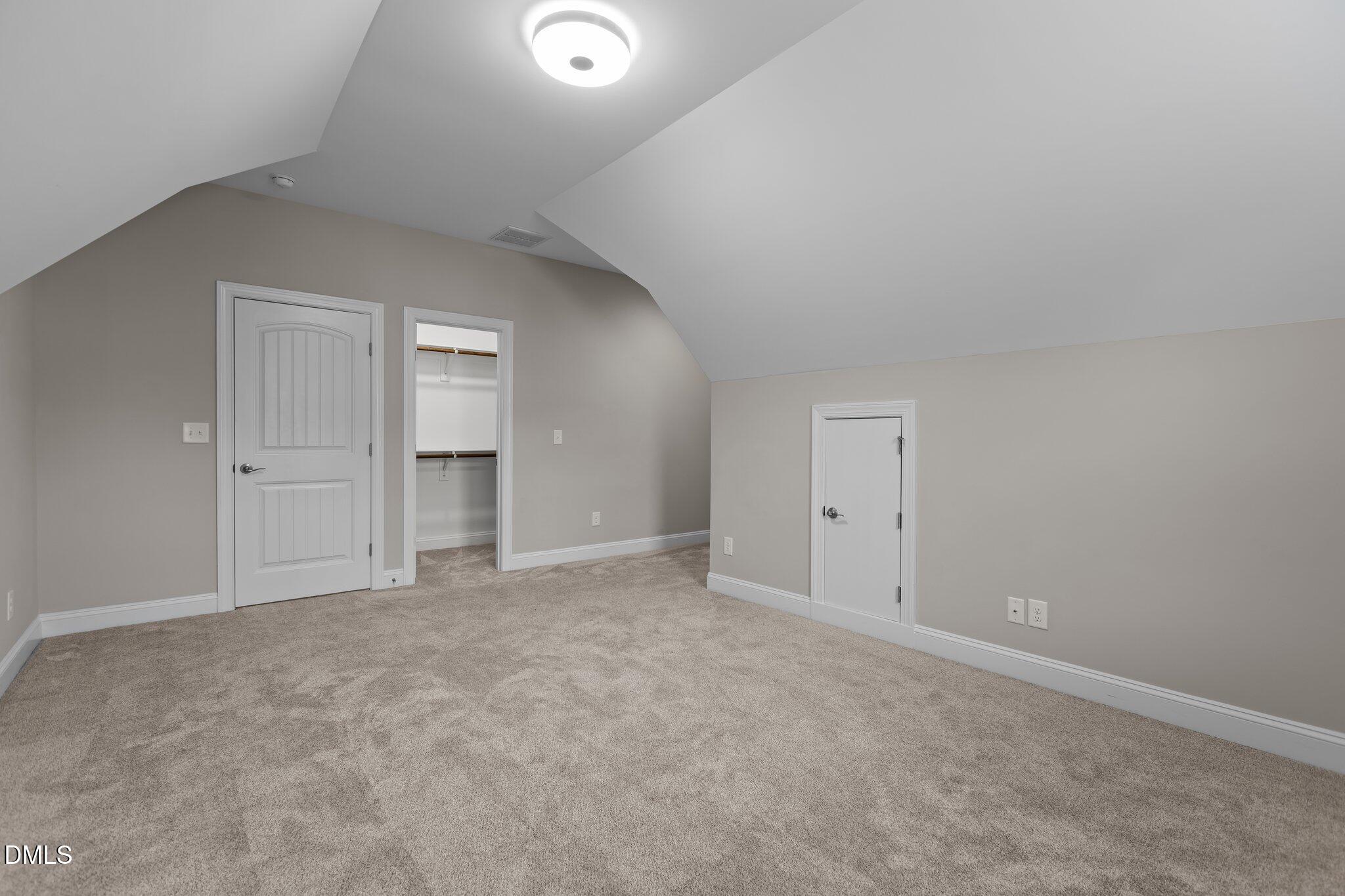 2923 Logan Valley Path Apex, NC 27502 - Photo 14 of 20 a view of an empty room and closet area