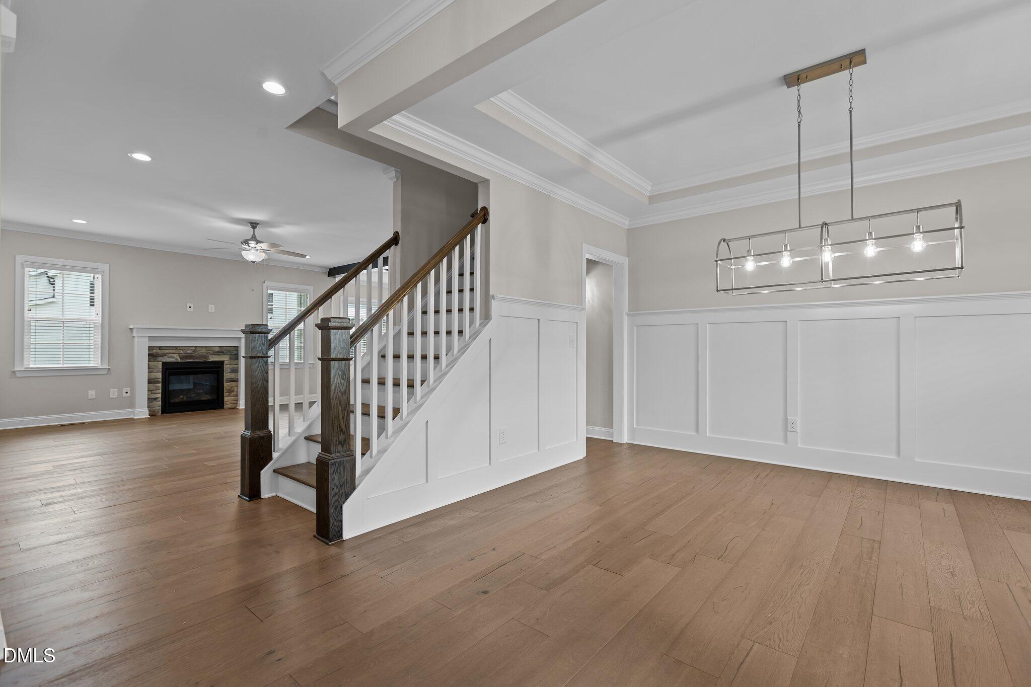 2923 Logan Valley Path Apex, NC 27502 - Photo 4 of 20 a view of an entryway with wooden floor