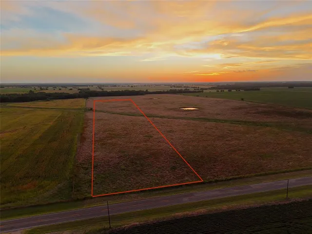 a view of a balcony with an ocean view