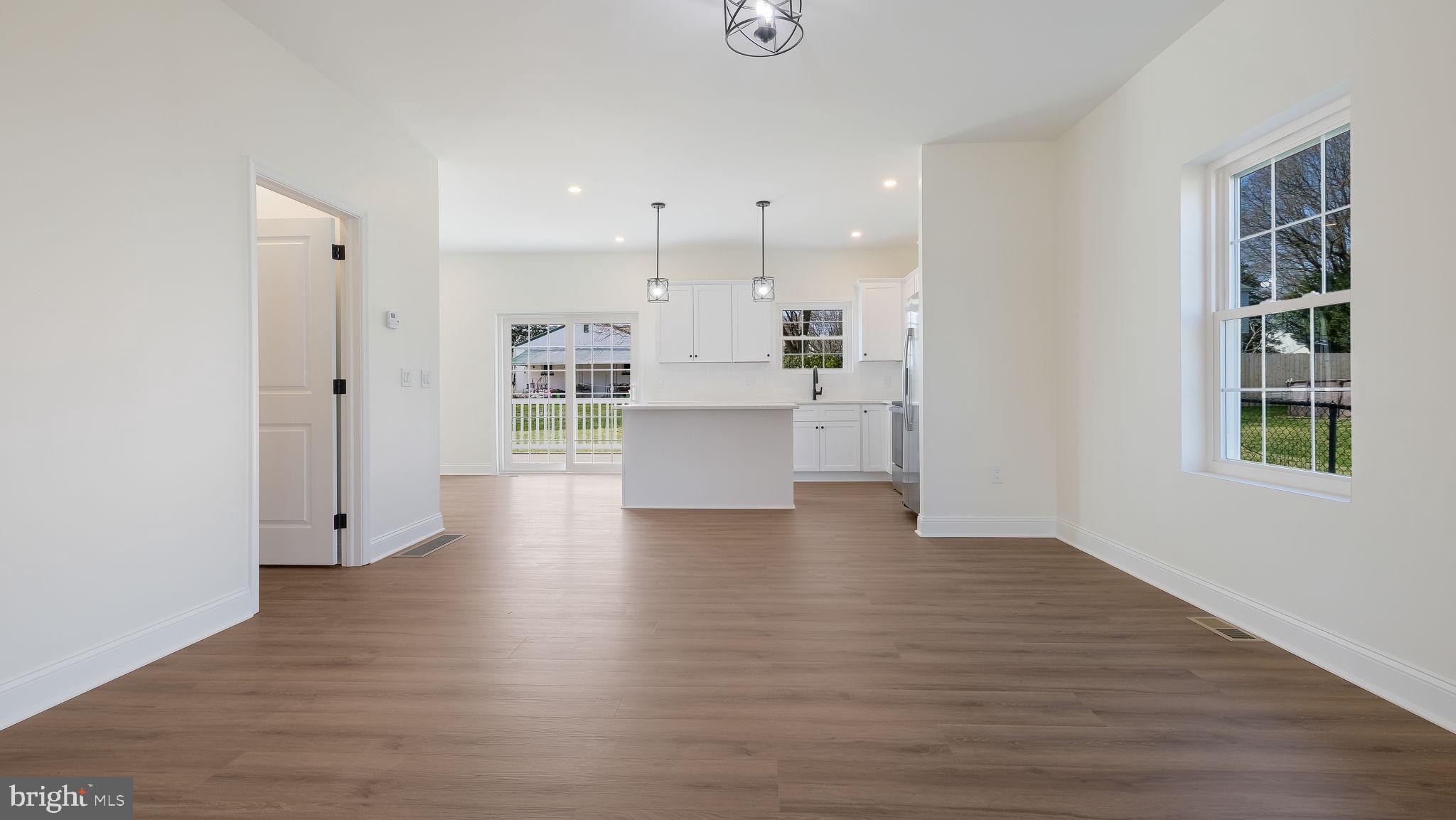 108 Patterson Road Aston, PA 19014 - Photo 15 of 39 Luxury vinyl plank floors on main level