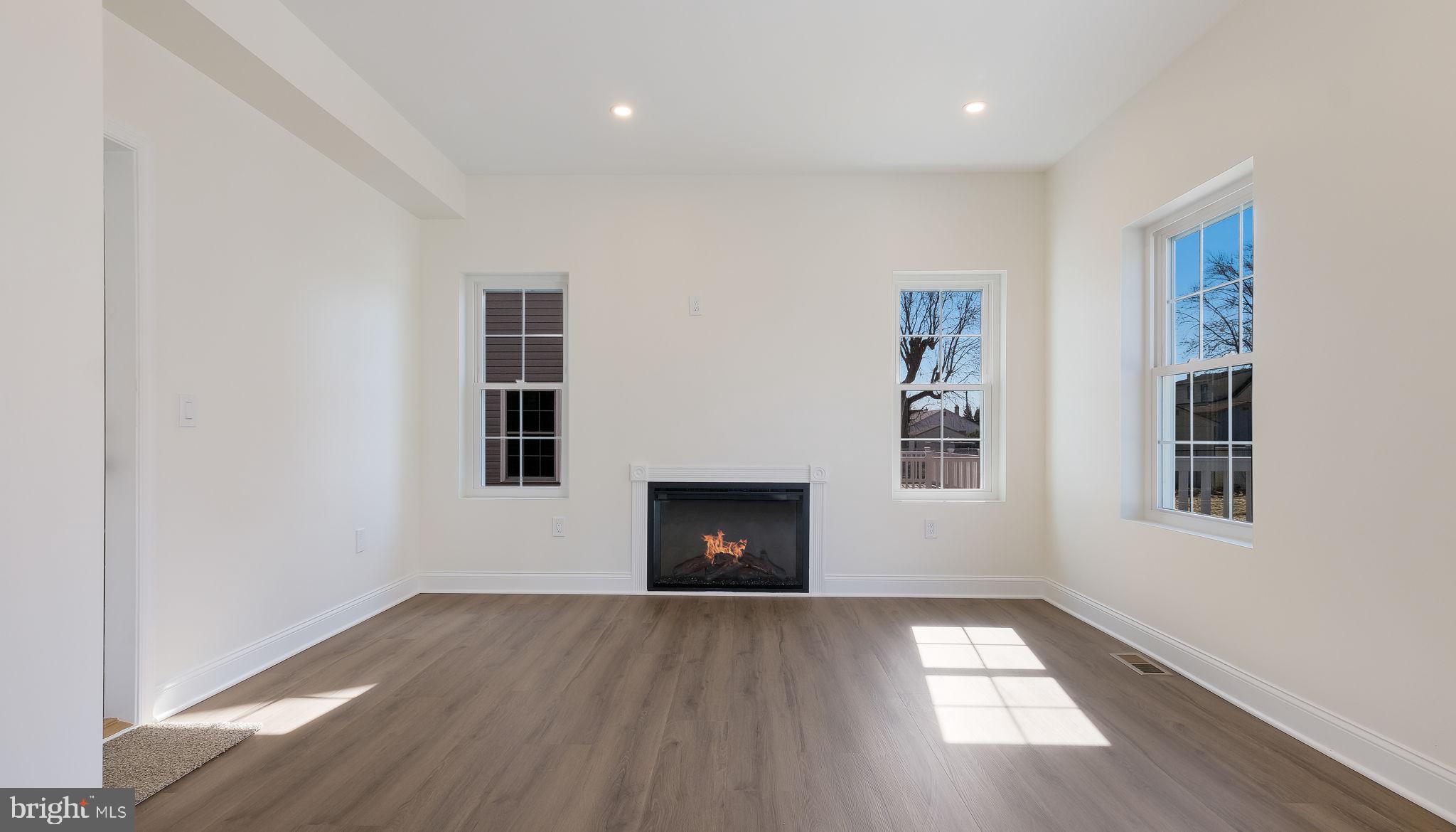 108 Patterson Road Aston, PA 19014 - Photo 16 of 39 Electric fireplace in family room