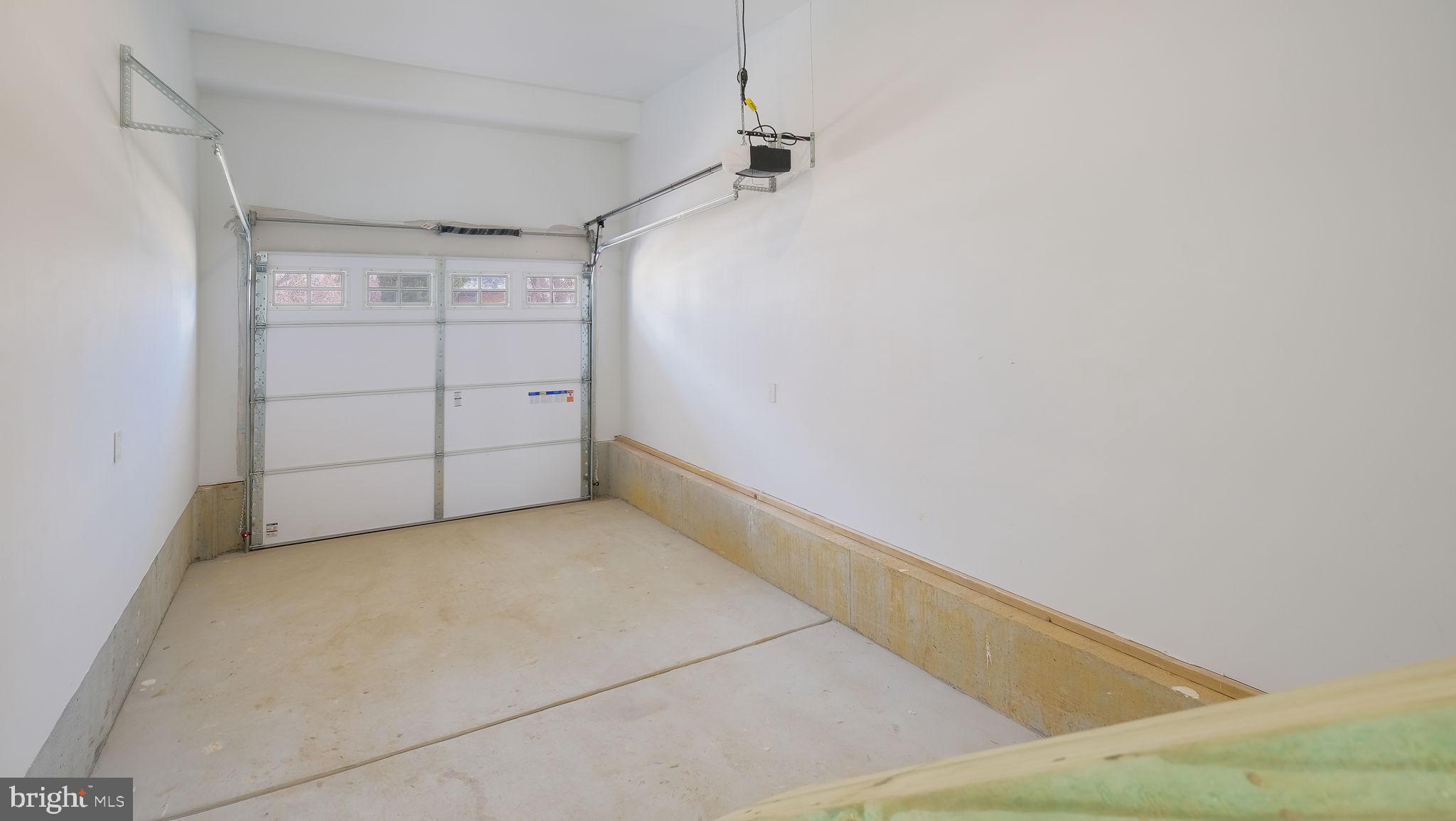 108 Patterson Road Aston, PA 19014 - Photo 35 of 39 One car garage with electric door opener