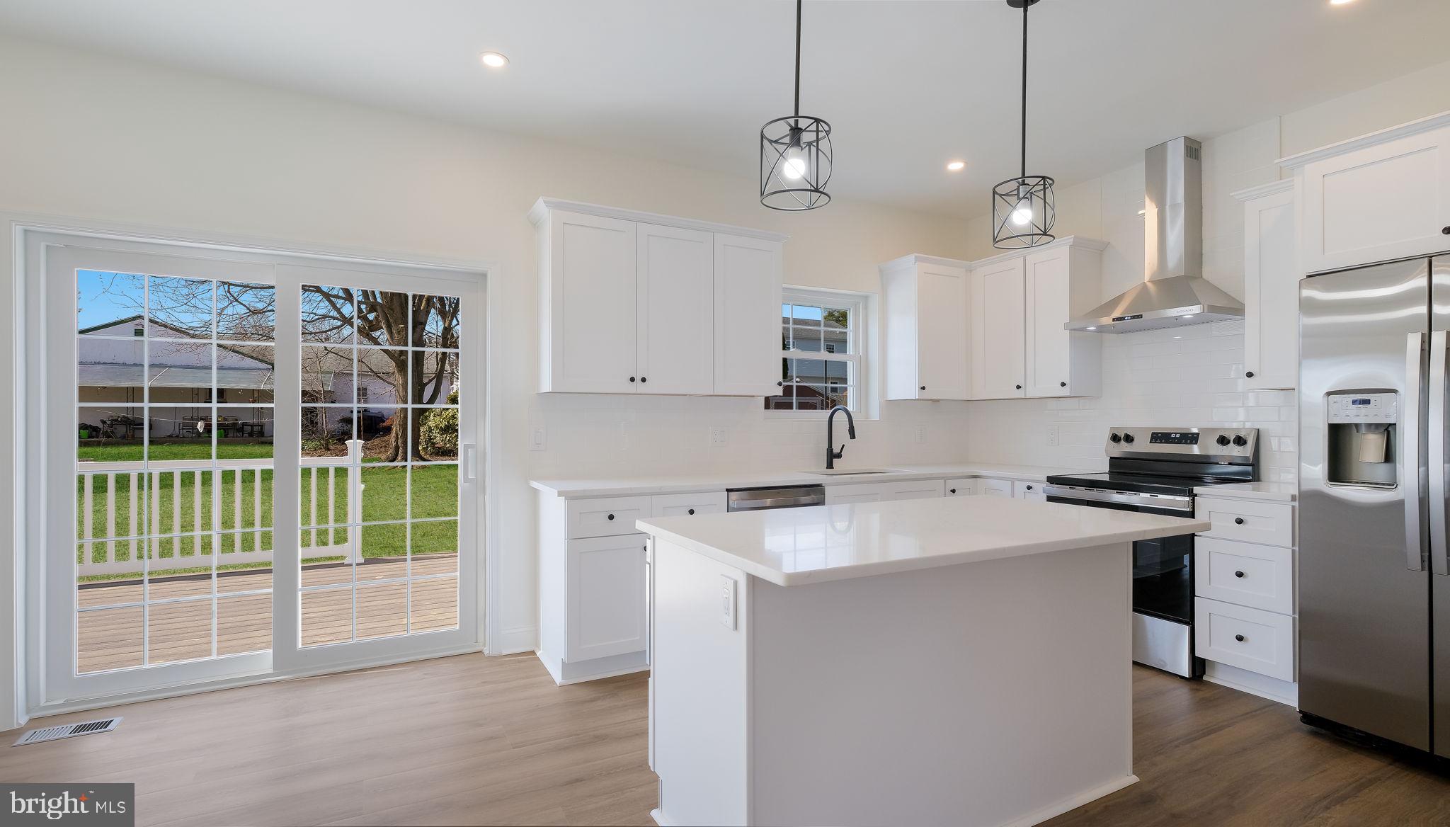 108 Patterson Road Aston, PA 19014 - Photo 5 of 39 Island with bar seating