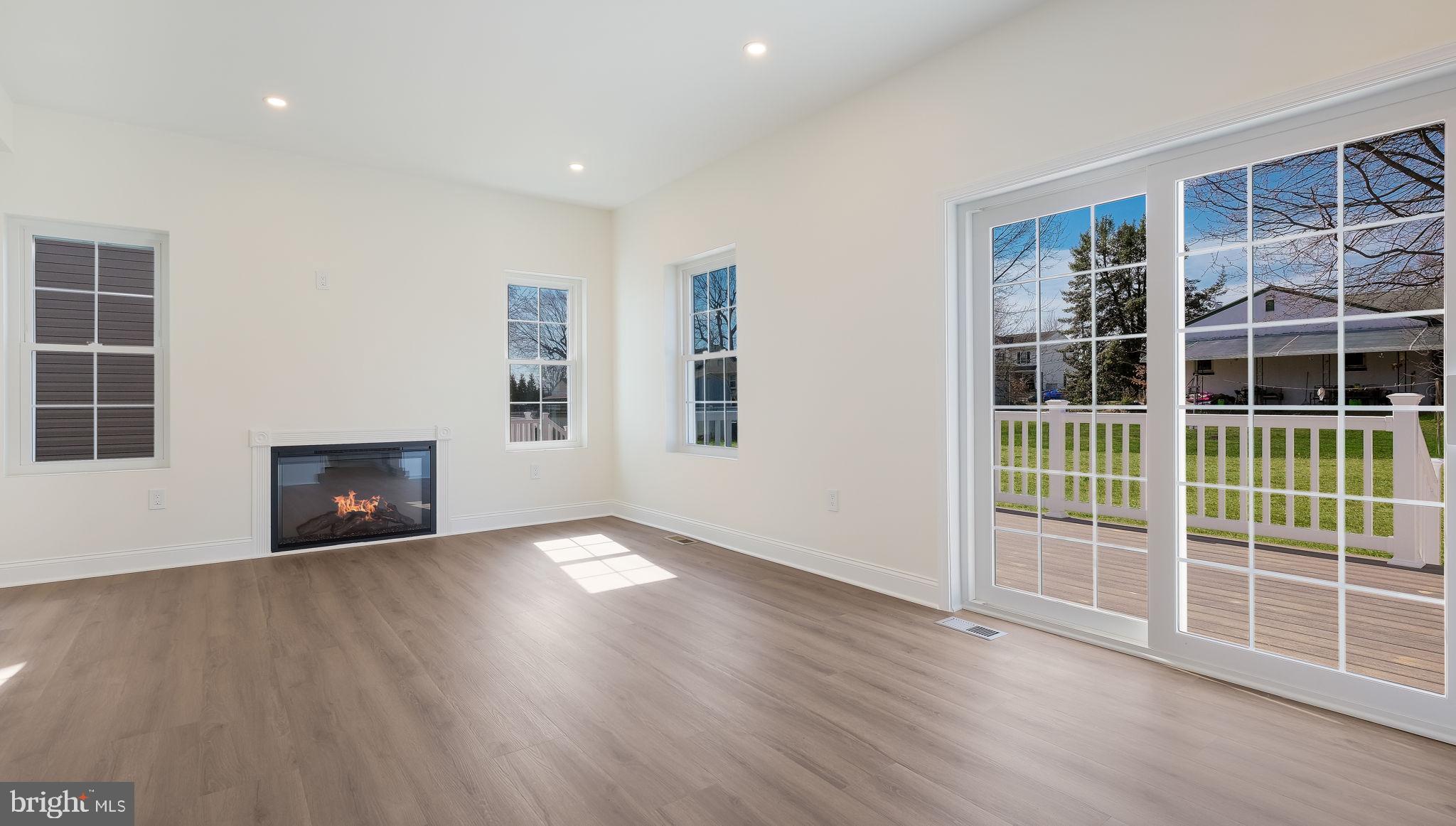 108 Patterson Road Aston, PA 19014 - Photo 9 of 39 Sliders from family room to deck