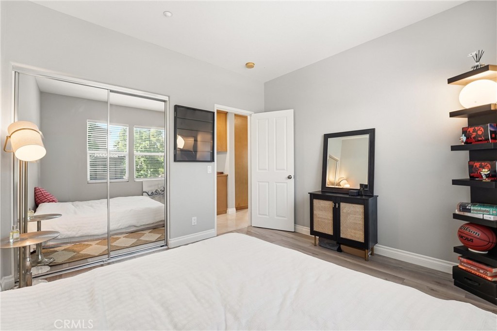 143 Lockford Irvine, CA 92602 - Photo 15 of 43 a bedroom with a bed and a window