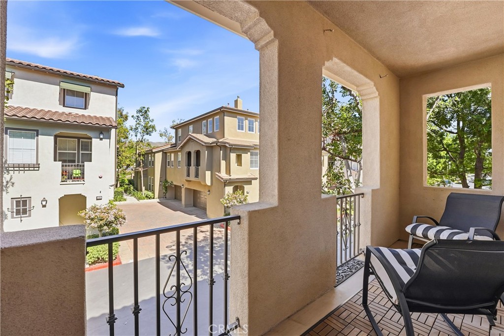 143 Lockford Irvine, CA 92602 - Photo 17 of 43 a balcony view with a seating space