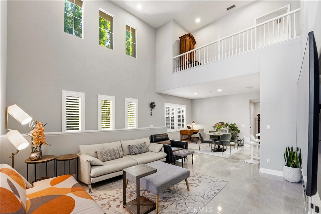 143 Lockford Irvine, CA 92602 - Photo 4 of 43 a living room with furniture and a large window