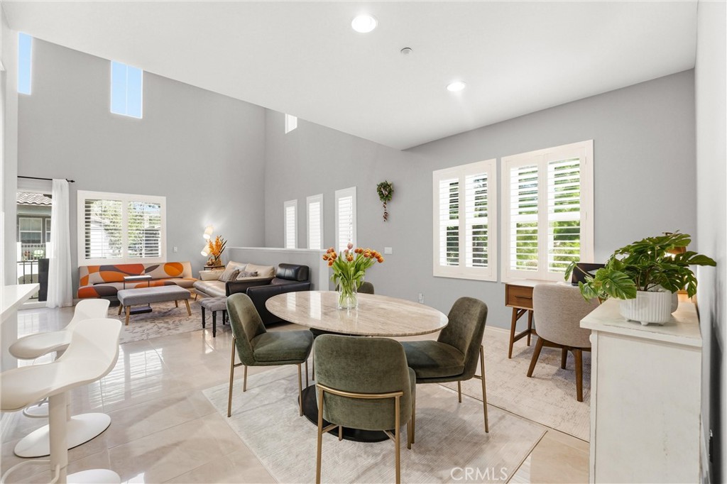 143 Lockford Irvine, CA 92602 - Photo 7 of 43 a living room with furniture and a large window