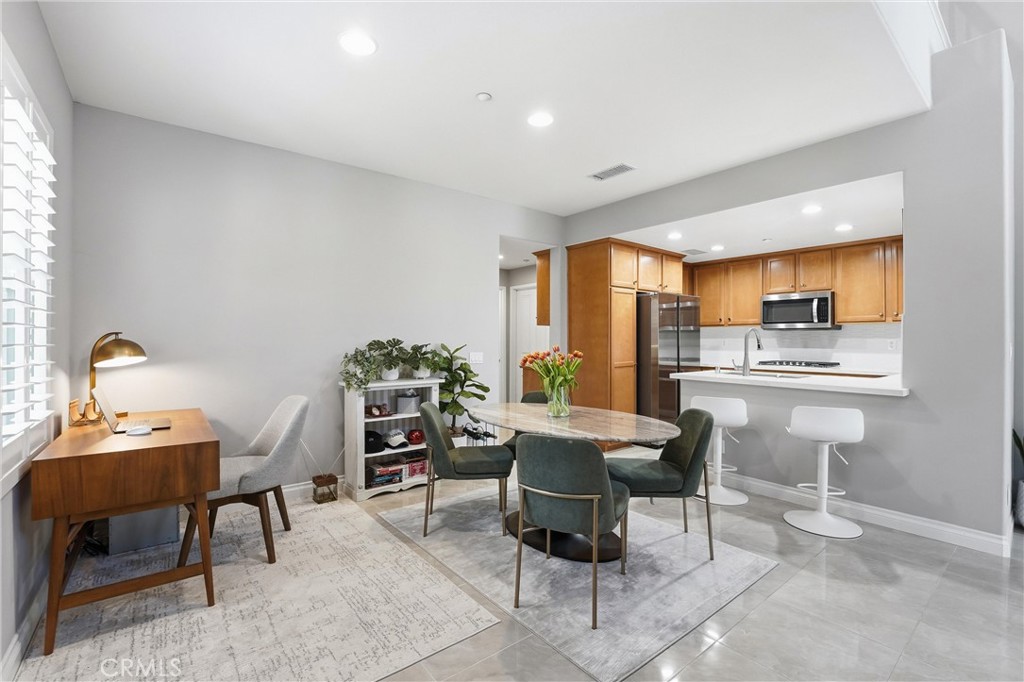 143 Lockford Irvine, CA 92602 - Photo 8 of 43 a workspace with furniture and a window