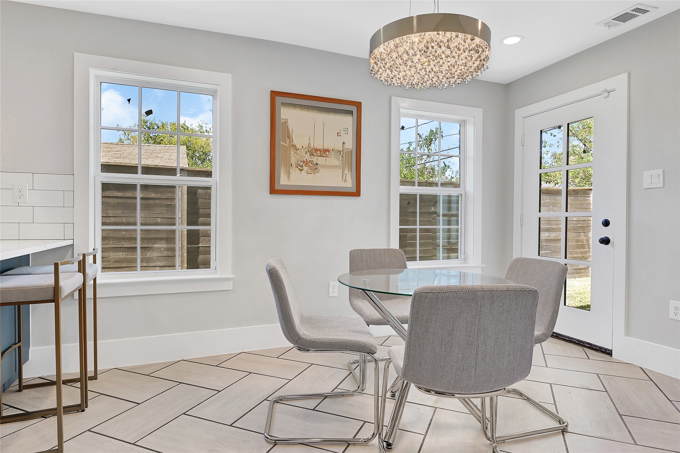3343 Tampa Street Houston, TX 77021 - Photo 14 of 41 a view of a dining room with furniture a rug and wooden floor