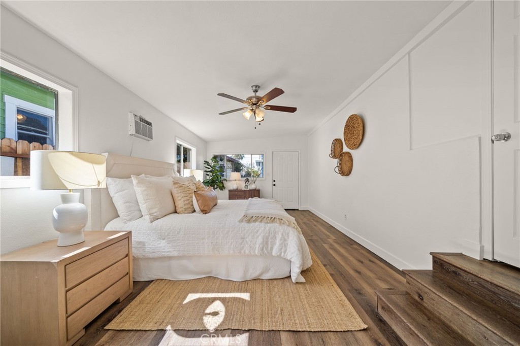 752 North Toledo Walk Long Beach, CA 90813 - Photo 16 of 32 a bedroom with a bed and window