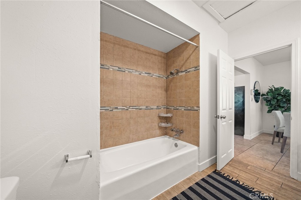 752 North Toledo Walk Long Beach, CA 90813 - Photo 19 of 32 a bathroom with a tub and shower