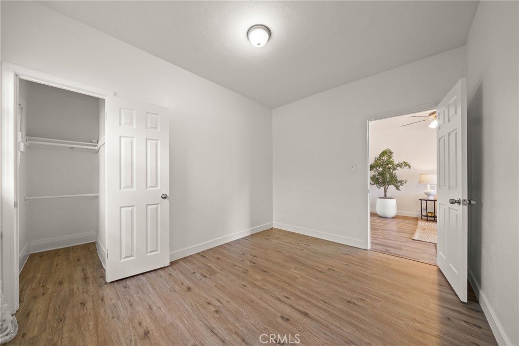 752 North Toledo Walk Long Beach, CA 90813 - Photo 22 of 32 wooden floor in an empty room with a window