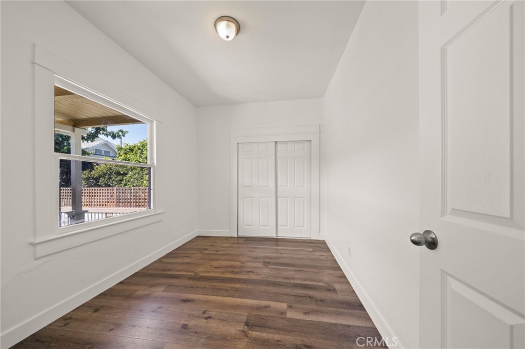 752 North Toledo Walk Long Beach, CA 90813 - Photo 24 of 32 a view of a livingroom with wooden floor and a window