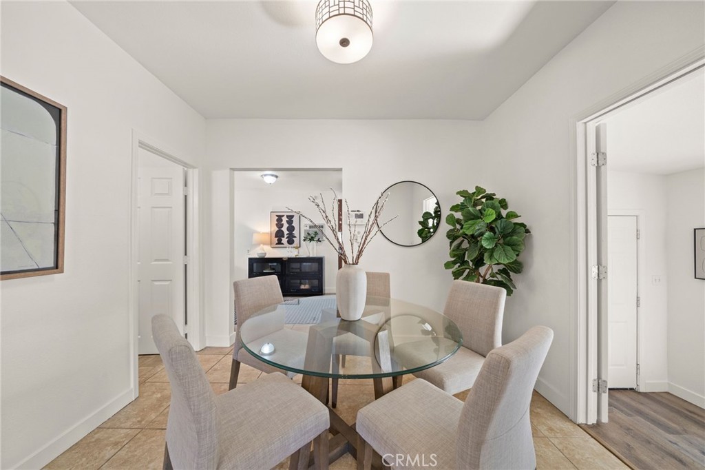 752 North Toledo Walk Long Beach, CA 90813 - Photo 6 of 32 a view of a dining room with furniture and wooden floor