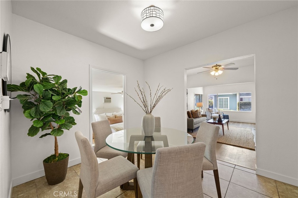 752 North Toledo Walk Long Beach, CA 90813 - Photo 7 of 32 a view of a dining room with furniture and chandelier