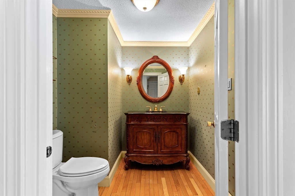 36 Cooke Road Plymouth, MA 02360 - Photo 15 of 37 a bathroom with a toilet and a mirror