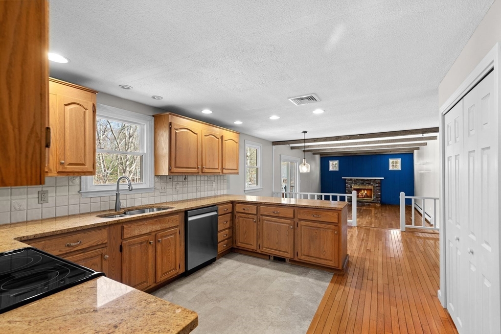 36 Cooke Road Plymouth, MA 02360 - Photo 4 of 37 a kitchen with lots of counter top space and view of living room