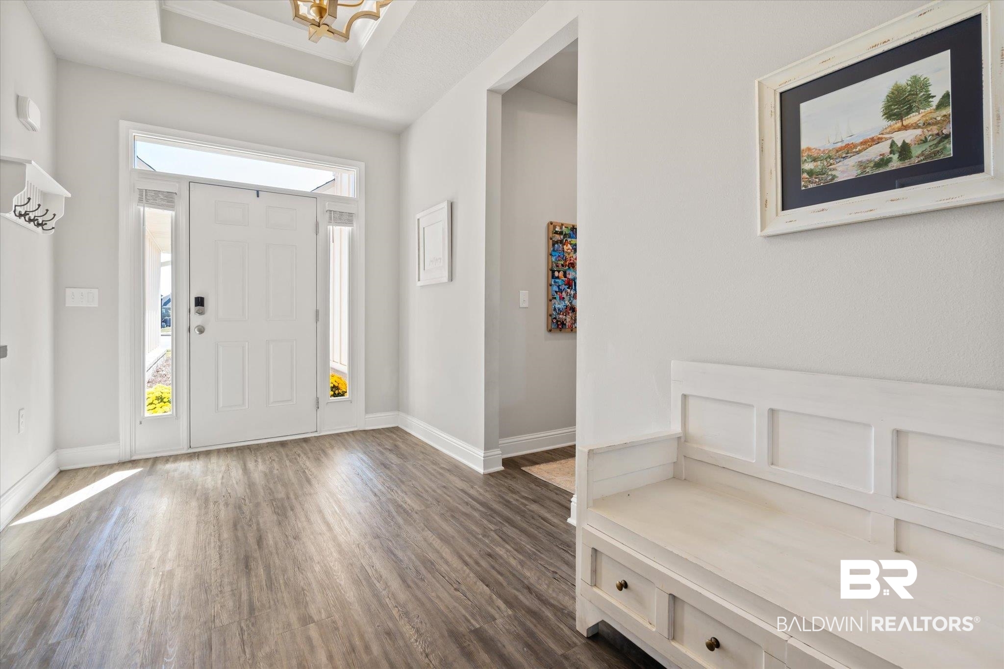 12899 Sanderling Loop Daphne, AL 36527 - Photo 5 of 28 Entrance foyer featuring a raised ceiling and dark hardwood / wood-style floors