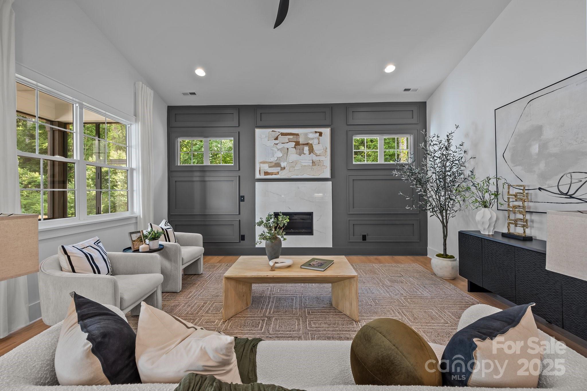 3945 Plainview Road Charlotte, NC 28208 - Photo 30 of 47 a living room with furniture fireplace and window