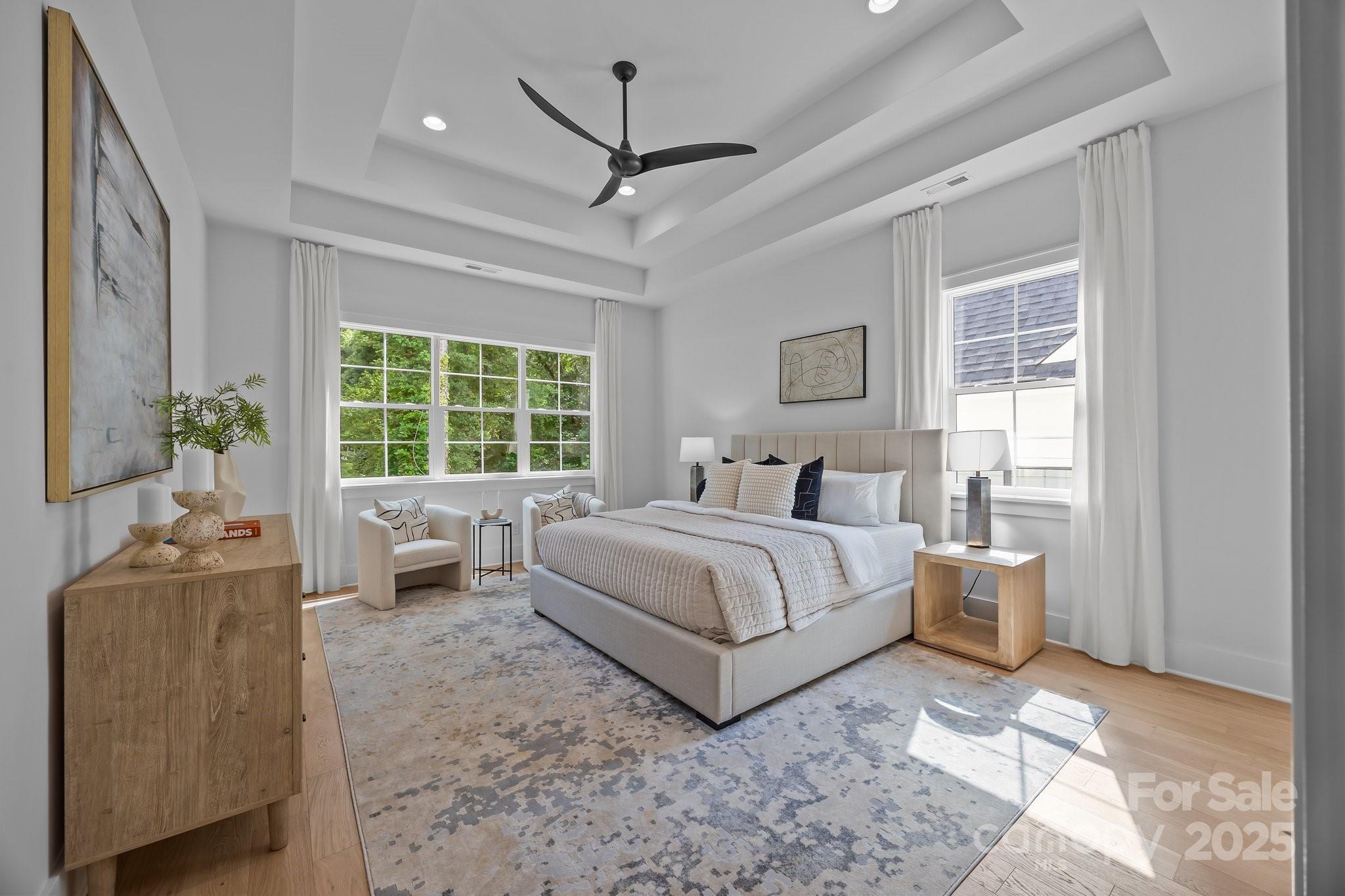 3945 Plainview Road Charlotte, NC 28208 - Photo 34 of 47 a bedroom with a large bed and a couch