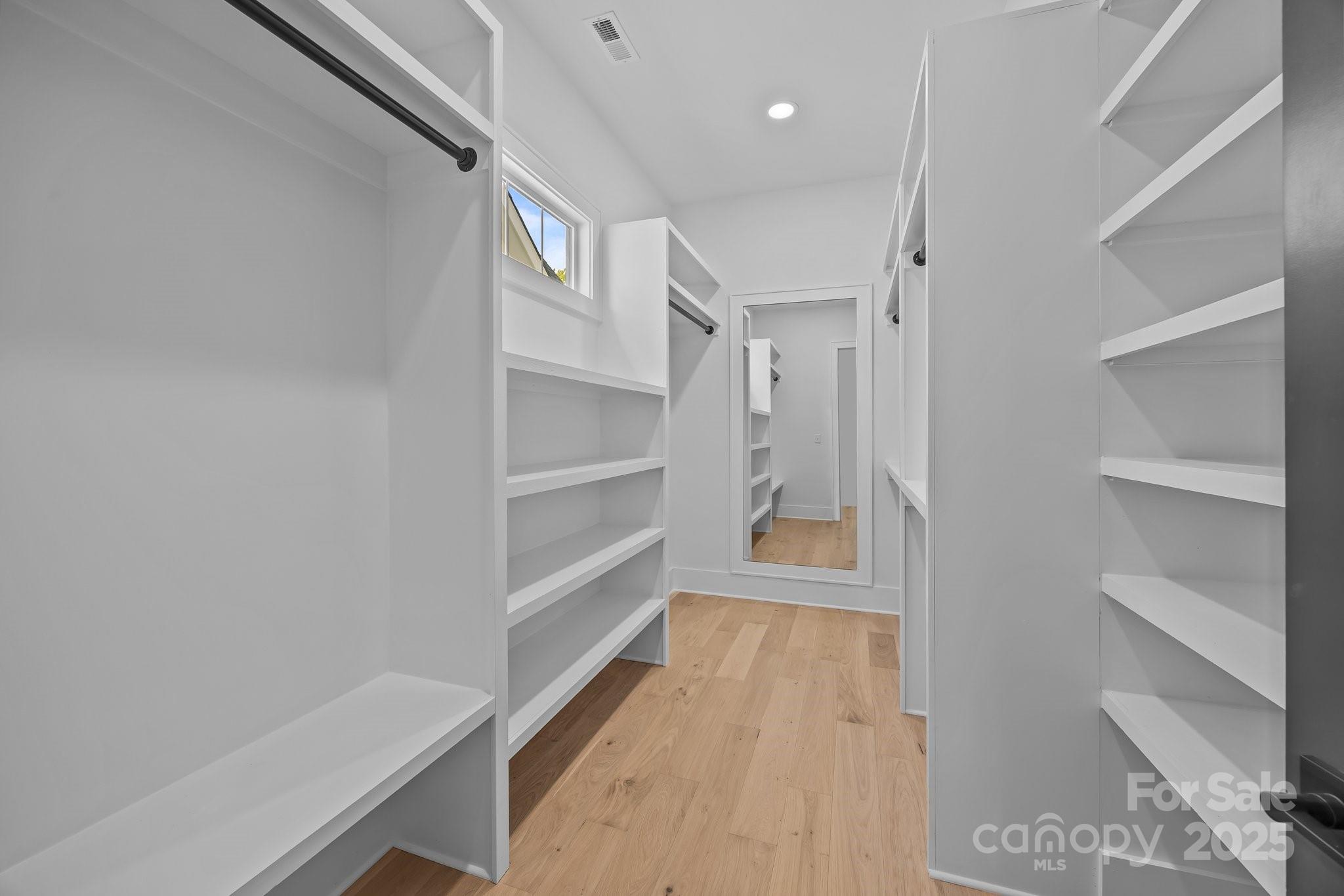 3945 Plainview Road Charlotte, NC 28208 - Photo 38 of 47 a view of a room with wooden floor and a window