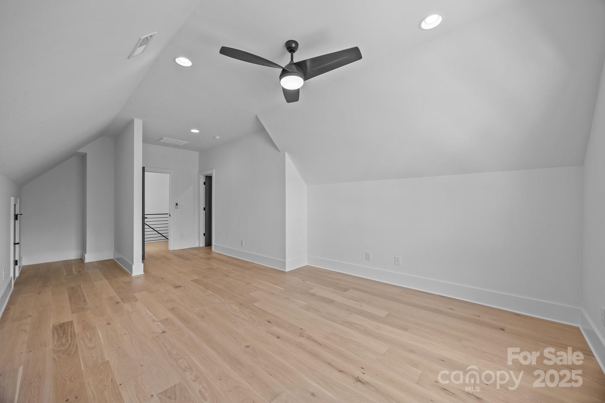 3945 Plainview Road Charlotte, NC 28208 - Photo 44 of 47 an empty room with ceiling fan and window