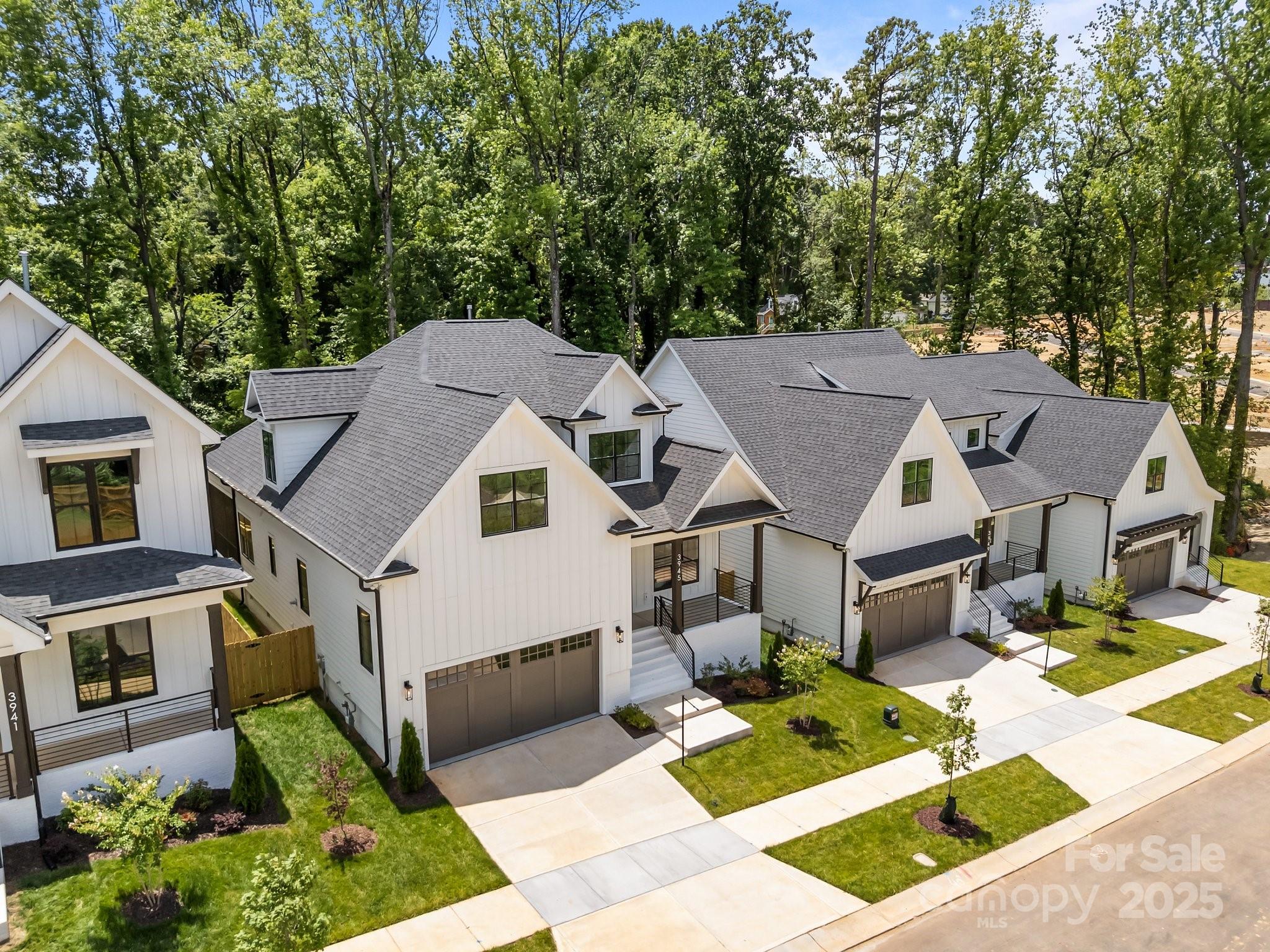 3945 Plainview Road Charlotte, NC 28208 - Photo 5 of 47 a aerial view of a house with garden
