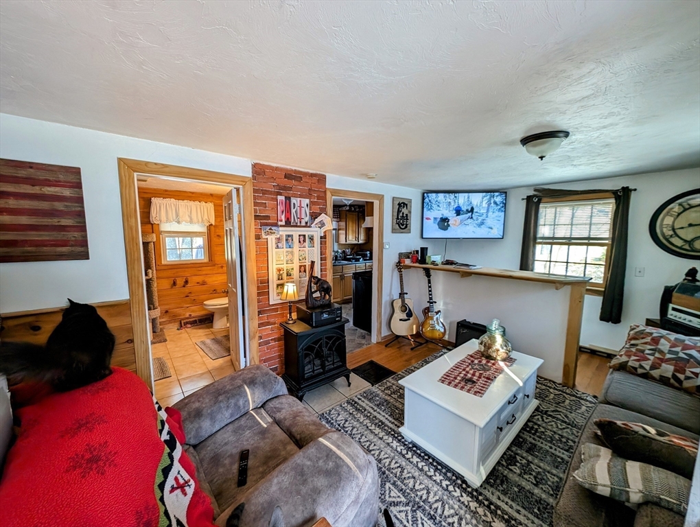 138 Old Worcester Road Charlton, MA 01507 - Photo 18 of 33 a living room with furniture and a window