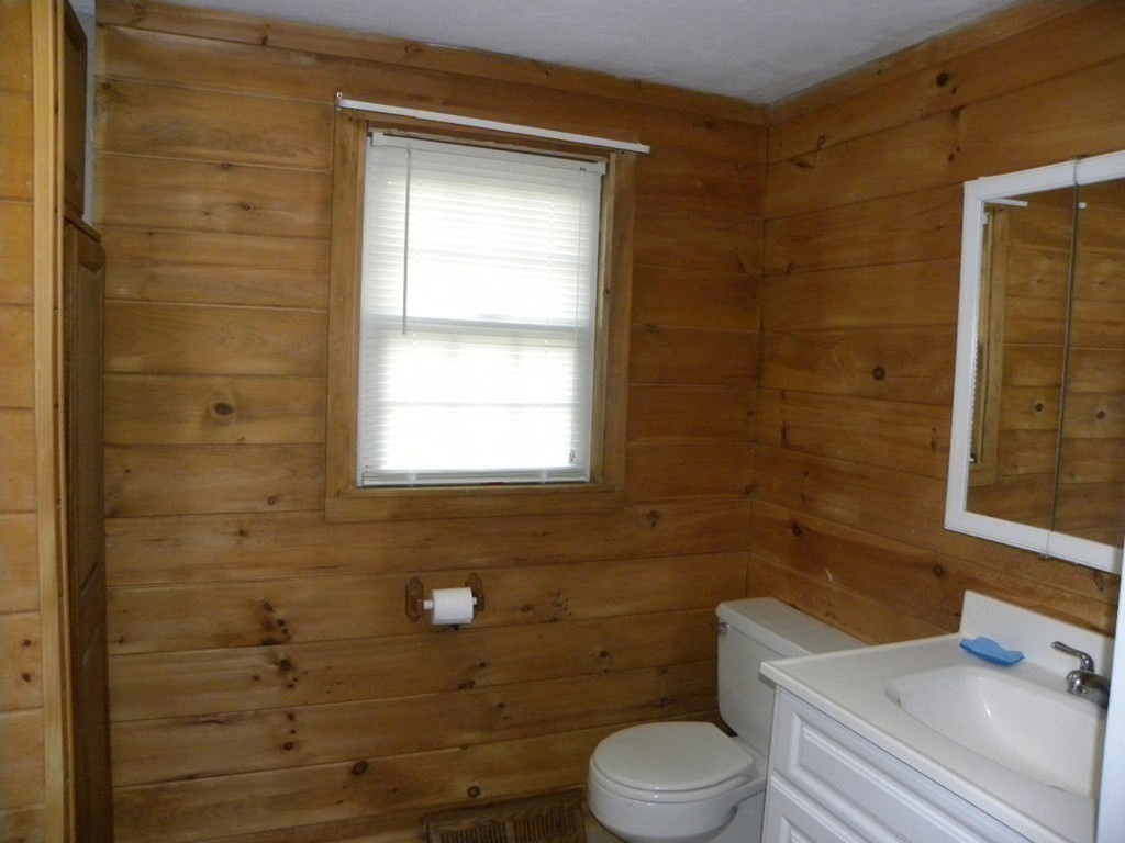 138 Old Worcester Road Charlton, MA 01507 - Photo 25 of 33 a bathroom with a toilet and a sink