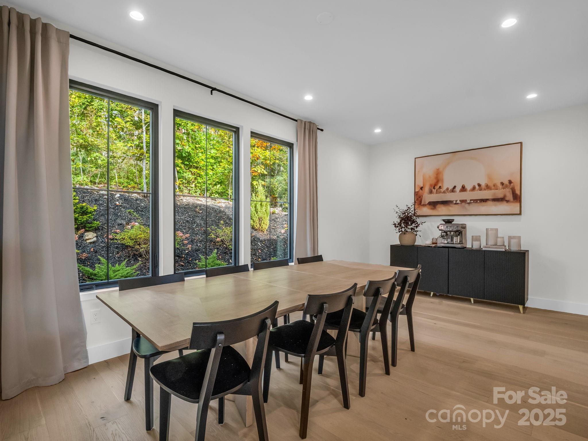 123 Millbrae Loop Hendersonville, NC 28791 - Photo 23 of 48 a view of a dining room with furniture window and outside view